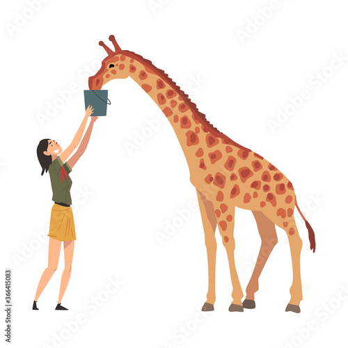 Female Zoo Worker Feeding Giraffe, Veterinarian or Professional Zookeeper Character Caring of Wild Animals in Zoo Cartoon Vector Illustration