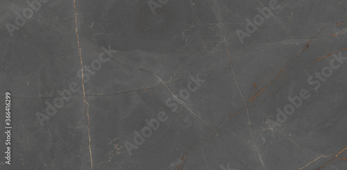 Grey marble surface with brown curly veins  rustic marble for decor home and wall and floor area also used for wallpaper and ceramic tile surface.