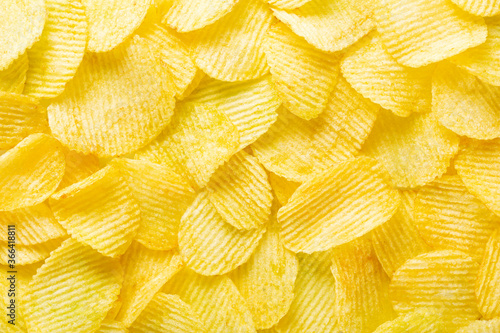 background corrugated golden chips with texture, top view