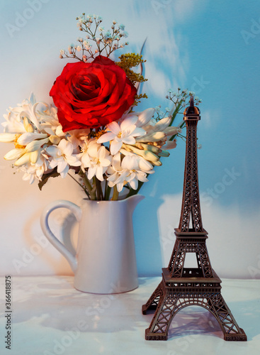 Paris Eiffel Tower Concept With Fresh Rose Flowers