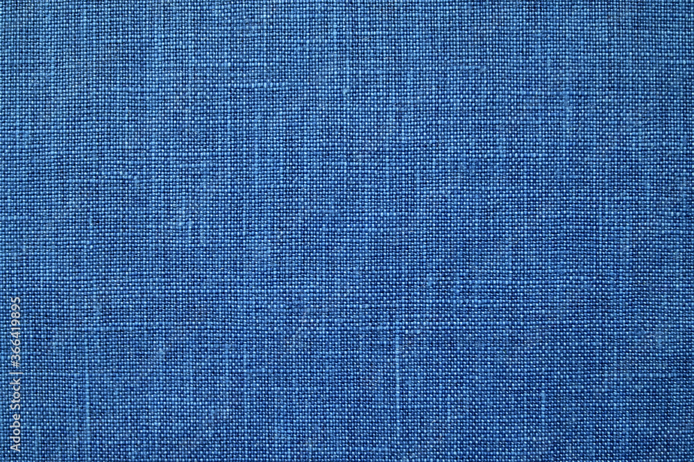 Blue linen background Weaving Canvas Fabric Texture background. or Natural dark blue cloth surface . Blue linen background Weaving Canvas Fabric Texture background. or Natural dark blue cloth surface .