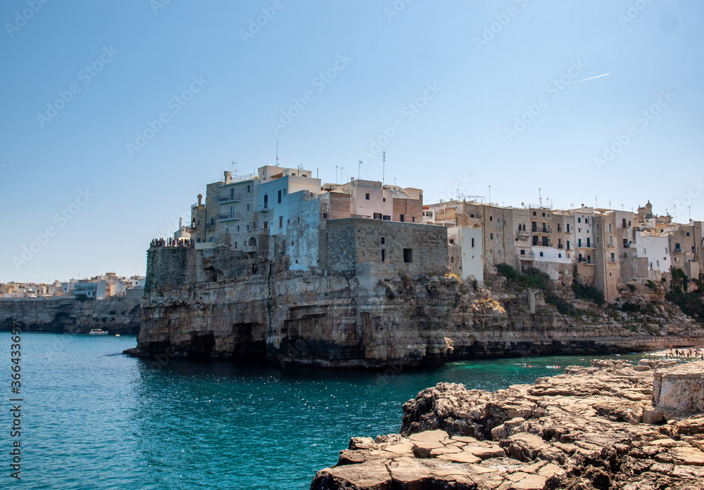  View of Polignano a mare - picturesque little town on cliffs of the Adriatic Sea. Apulia, Southern Italy