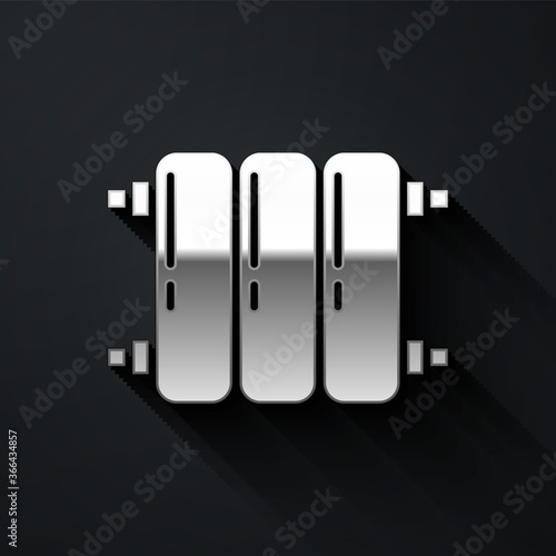 Silver Heating radiator icon isolated on black background. Long shadow style. Vector Illustration.