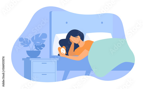 Sleepless woman lying in bed and looking at alarm clock isolated flat vector illustration. Cartoon female person with sleep disorder. Insomnia and sadness concept