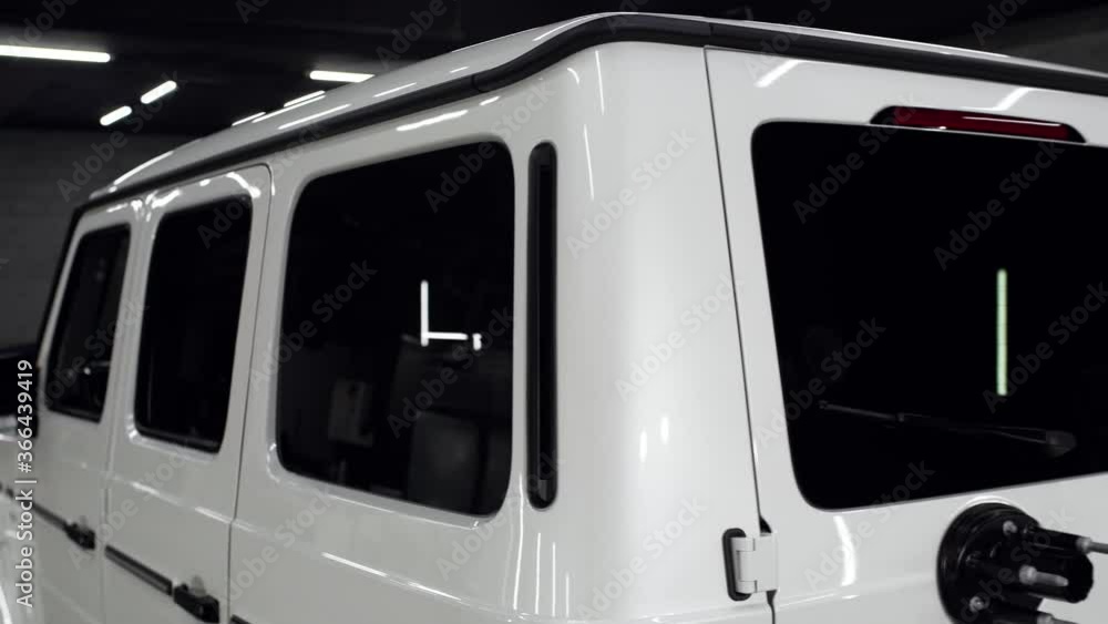 Side glass of a bucking white car Stock Video | Adobe Stock