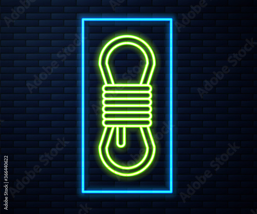 Glowing neon line Climber rope icon isolated on brick wall background. Extreme sport. Sport equipment. Vector Illustration.