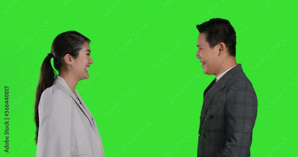 Portrait of business people discussing about work at green screen background. Portrait of business people discussing about work at green screen background.