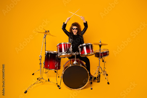 Fototapete Full body photo of popular rocker redhair lady plays instruments beat raise hand