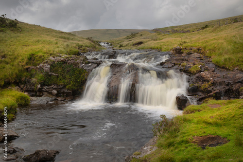 A waterfall on the river Tawe in its early stages in the Brecon Beacons, South Wales UK 