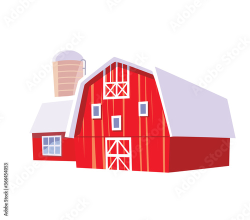 Red wooden barn with grain elevator. Farm buildings. Old barn in the countryside
