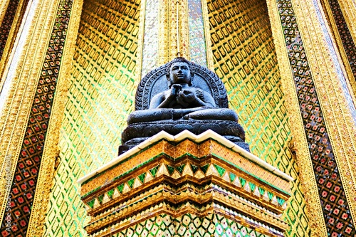 Buddha statue in a golden temple in Thailand