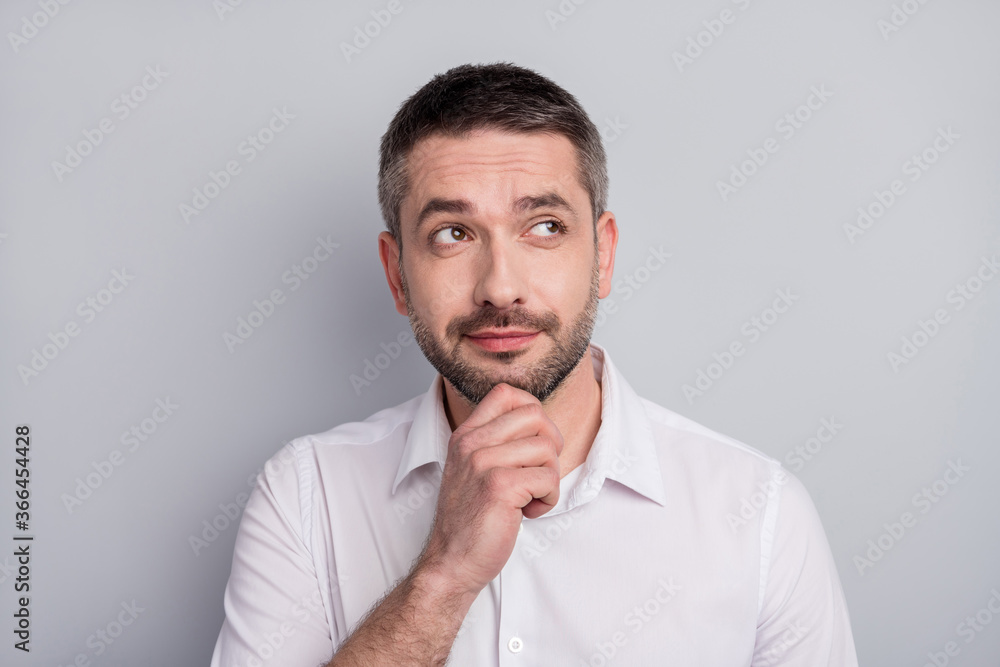 Close-up portrait of his he nice attractive minded mature man executive manager wearing white shirt overthinking choosing options isolated over light gray pastel color background Close-up portrait of his he nice attractive minded mature man executive manager wearing white shirt overthinking choosing options isolated over light gray pastel color background