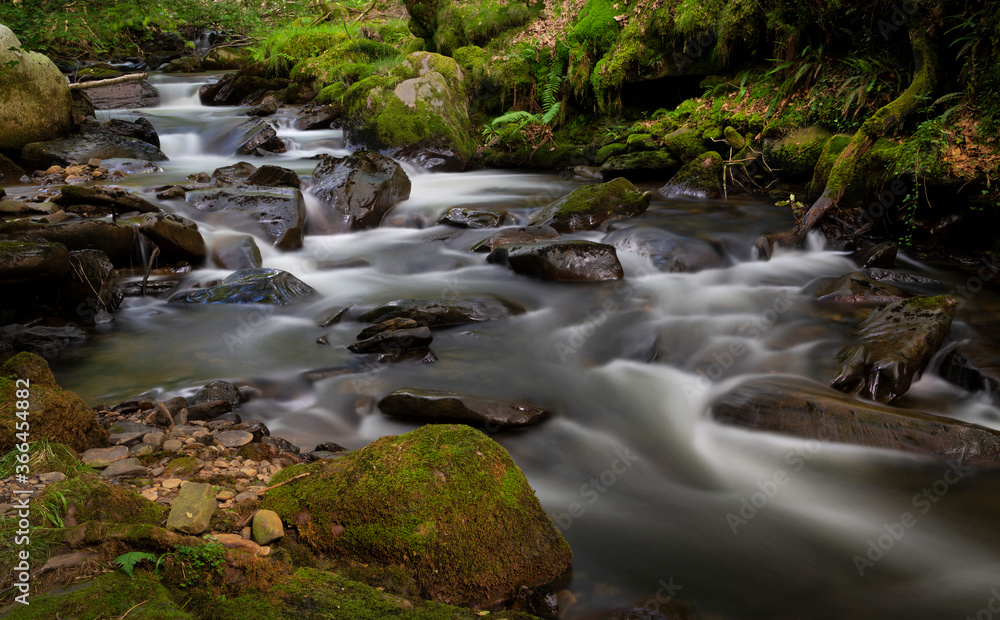 The gushing river after days of heavy rainfall at Melincourt Brook in Resolven, South Wales, UK The gushing river after days of heavy rainfall at Melincourt Brook in Resolven, South Wales, UK