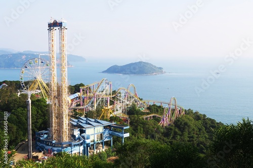 Having fun in  an amusement park beside the sea
