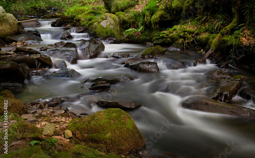 The gushing river after days of heavy rainfall at Melincourt Brook in Resolven  South Wales  UK