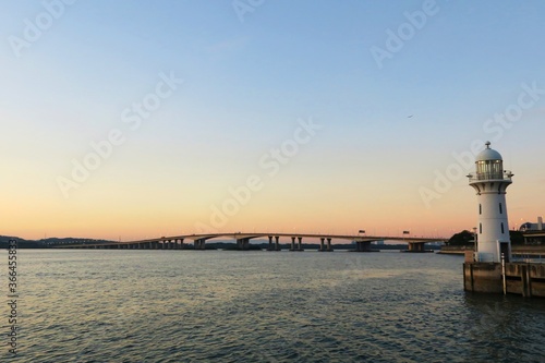 Lighthouse in Tuas and the bridge connecting Singapore and Johor, Tuas Second Link, in the evening
