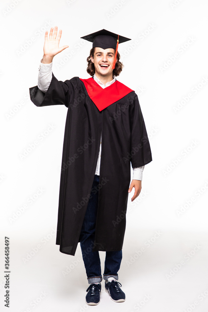 Graduate man student in mantle greets with his hand, isolated on white background Graduate man student in mantle greets with his hand, isolated on white background