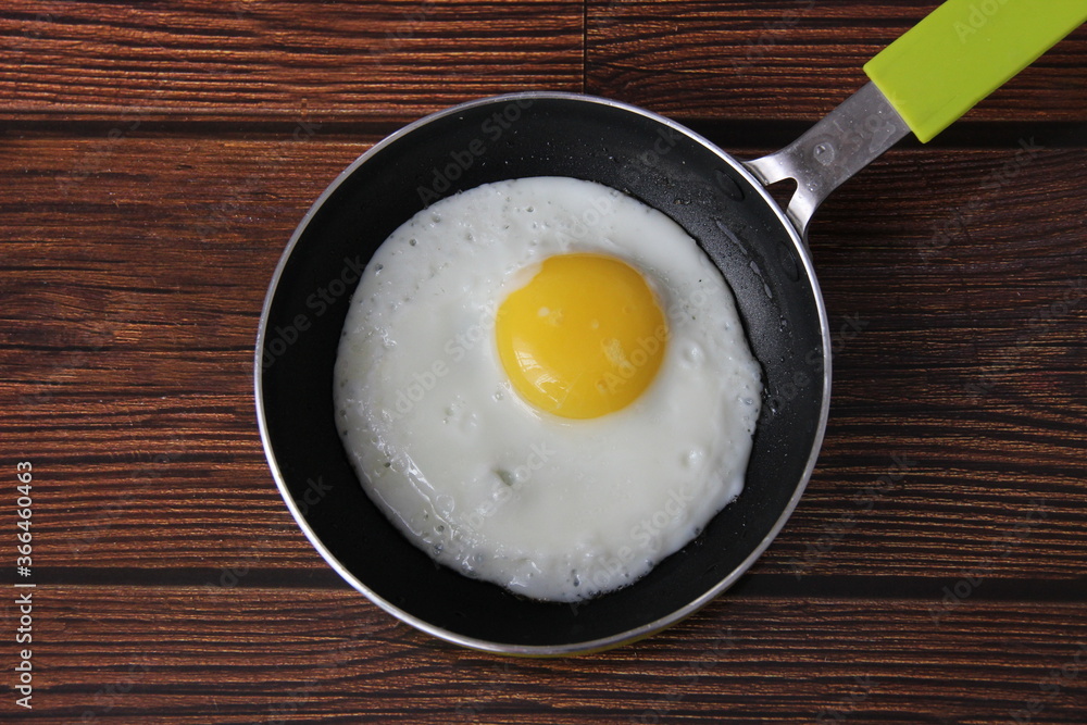 Fried chicken egg in a frying pan Fried chicken egg in a frying pan