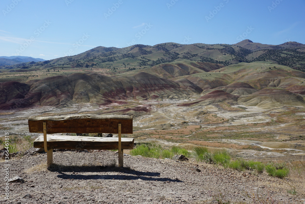 Wooden bench overlooking the Painted Hills - Oregon, United States Wooden bench overlooking the Painted Hills - Oregon, United States