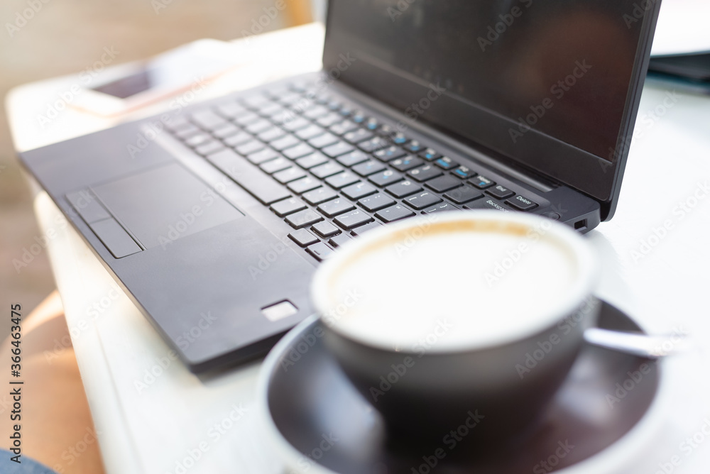 Working on laptop from cafe. Busy people lifestyle. Working on laptop from cafe. Busy people lifestyle.