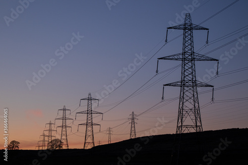 Pylon shilhouetts in the evening sky