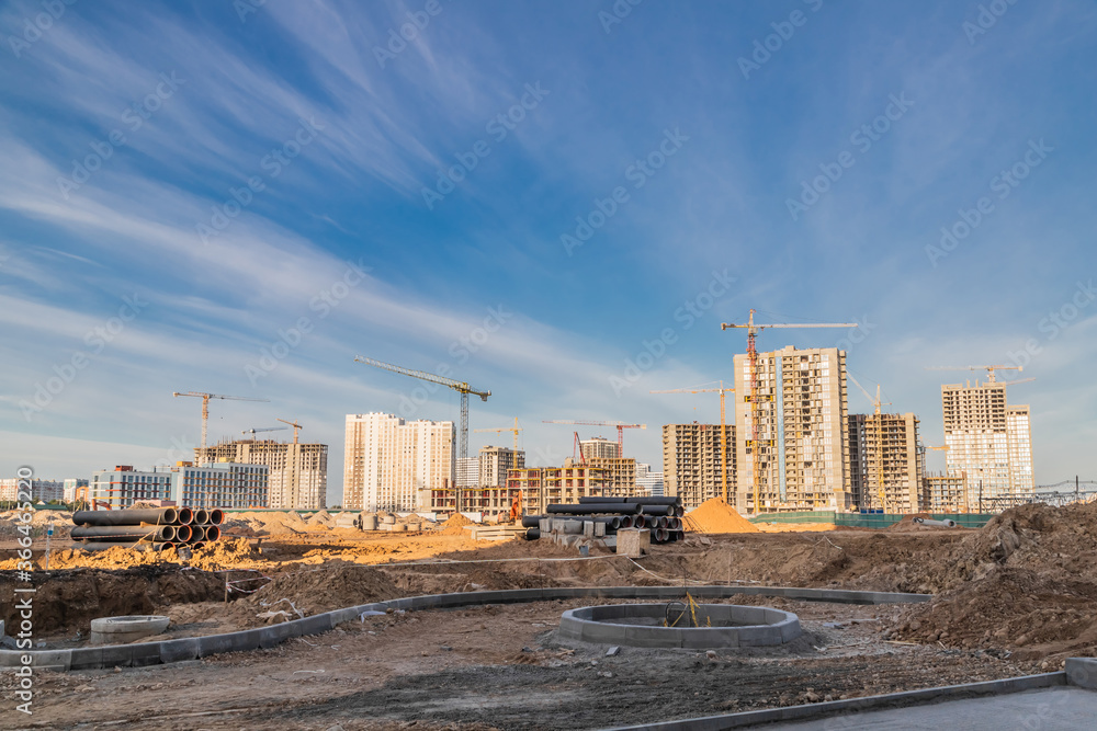 Fototapeta premium Development of a new district with high multi-storey buildings