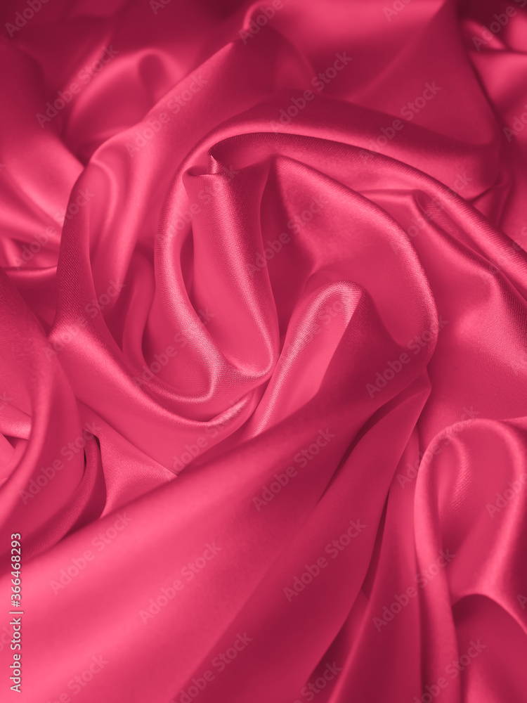 Obraz premium Beautiful elegant wavy light pink satin silk luxury cloth fabric texture, abstract background design. Copy space