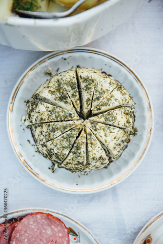 White Cheese on a dinner table spread during Latvian Midsummer celebration of Līgo