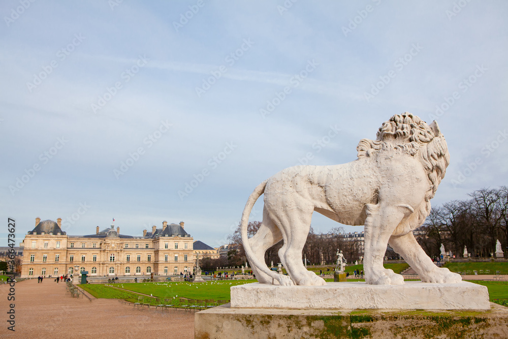 Sculpture of Lion in Luxembourg Gardens from Paris . Statue of wild animal in the park