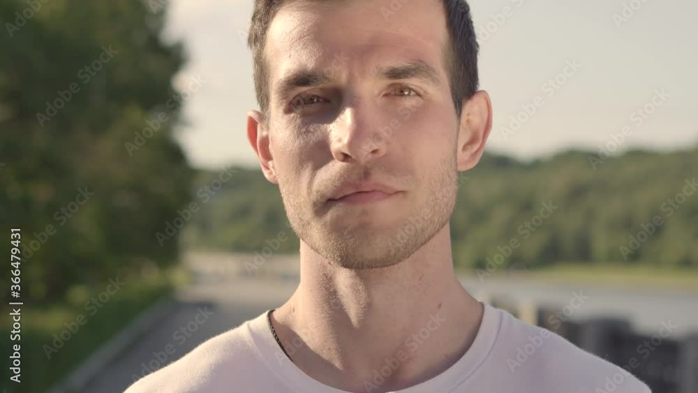 Young male athlete looking at camera Young male athlete looking at camera