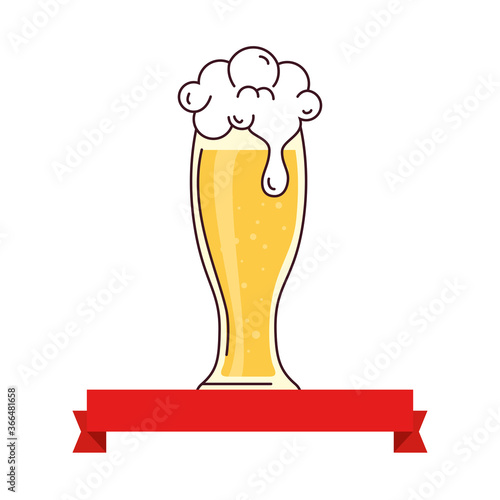 glass of beer with ribbon decoration on white background