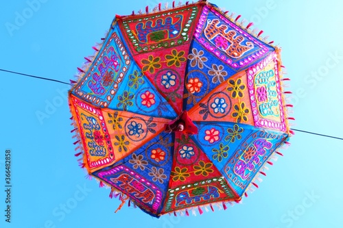 Umbrella hanging in the sky, colorful umbrella