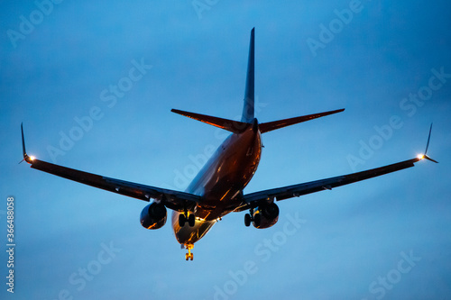airplane landing in the blue sky