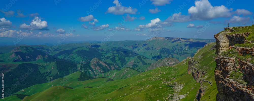 Man Stands on the Abyss Bermamyt Plateau, Caucasus Elbrus Region, Panorama