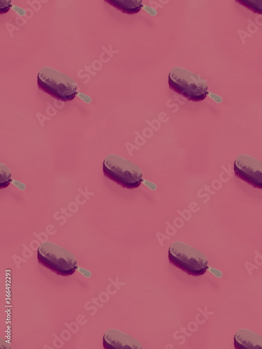 Chocolate ice cream on pink background