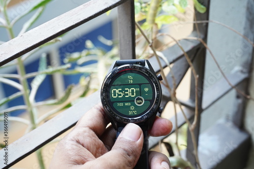 A round black smart watch