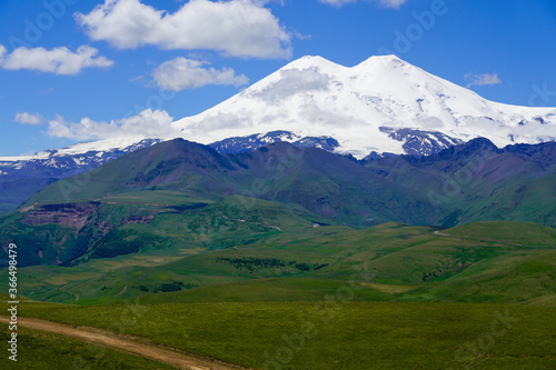 Panorama Mount Elbrus with Green Meadows at Summer. North Caucasus, Russia © ggfoto