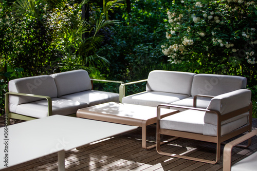 Terrace with modern furniture in the garden 
