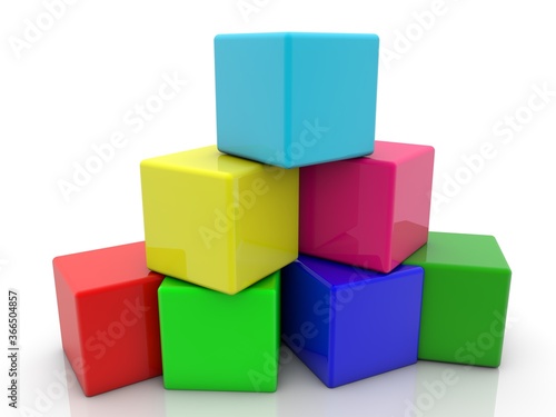 Colored toy blocks stacked in a pyramid on top of each other