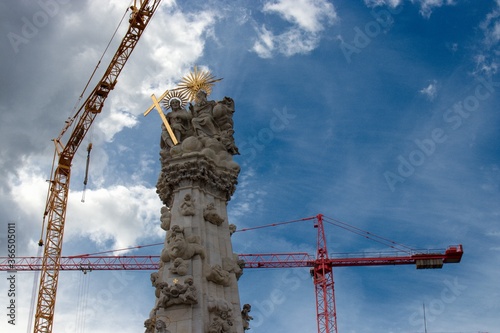 Holy Trinity Statue with Crane, in the Castle District in Budapest, Hungary photo