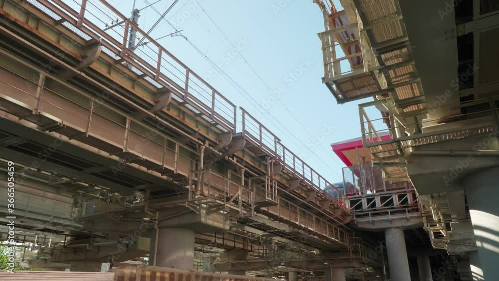 Low angle view of bridge with railways for trains. View from under the bridge. Railways.