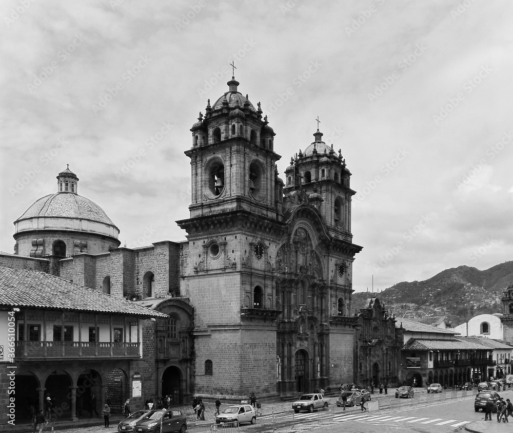black and white photograph of a church in the city of Cusco.