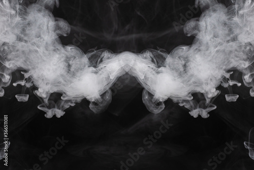 White steam on a black background.