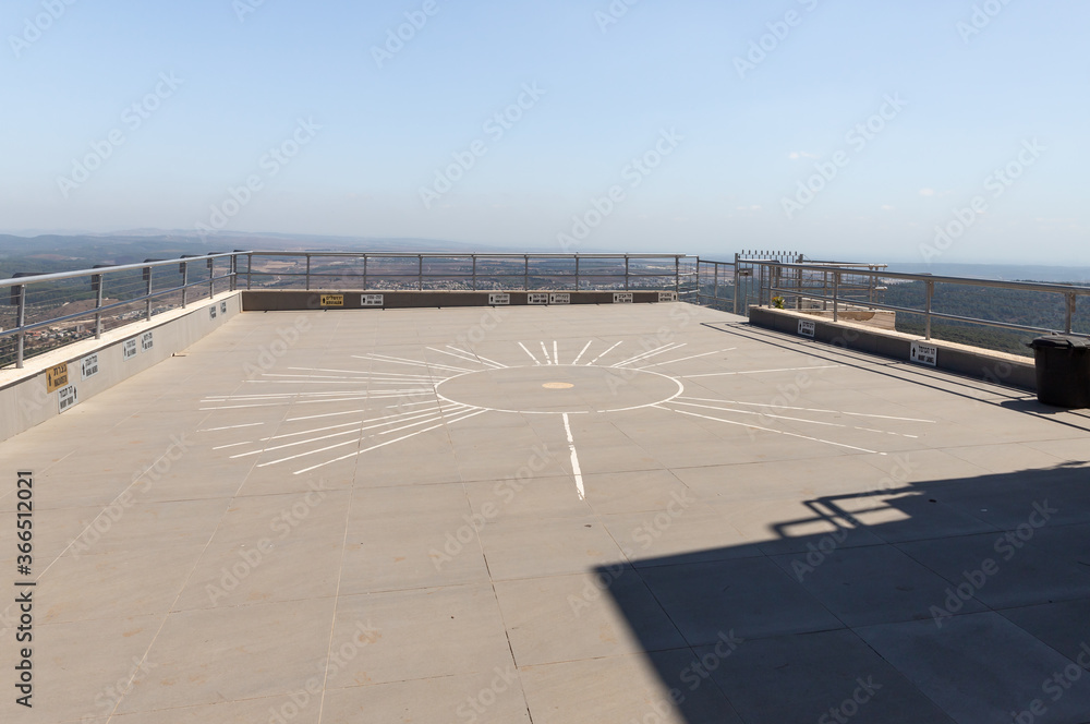 The pointer to different cities and towns of the country is on the roof of the Deir Al-Mukhraqa Carmelite Monastery in northern Israel