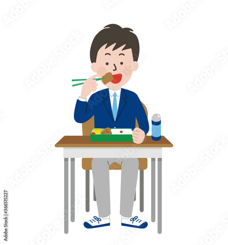 席に座ってお弁当を食べる男子学生