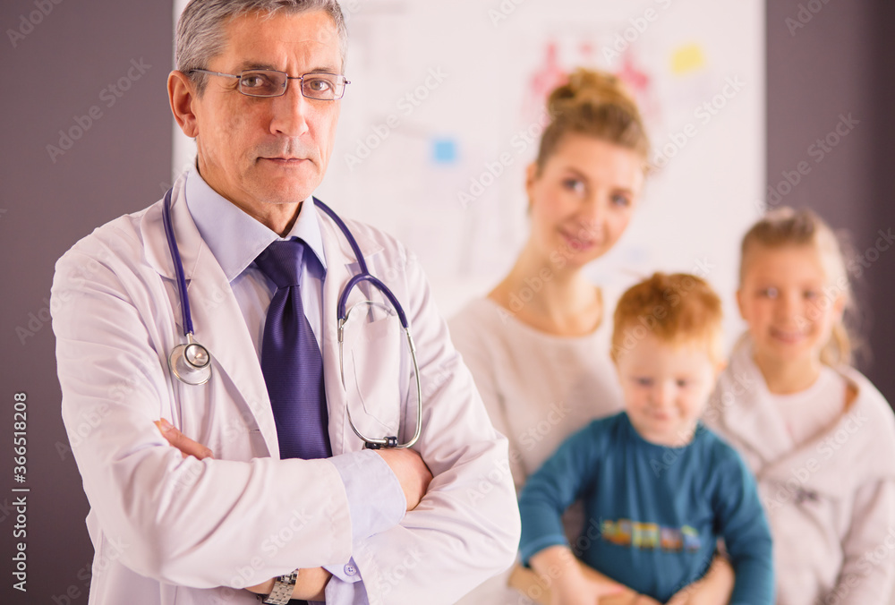 Little children with her mother at a doctor on consultation Little children with her mother at a doctor on consultation