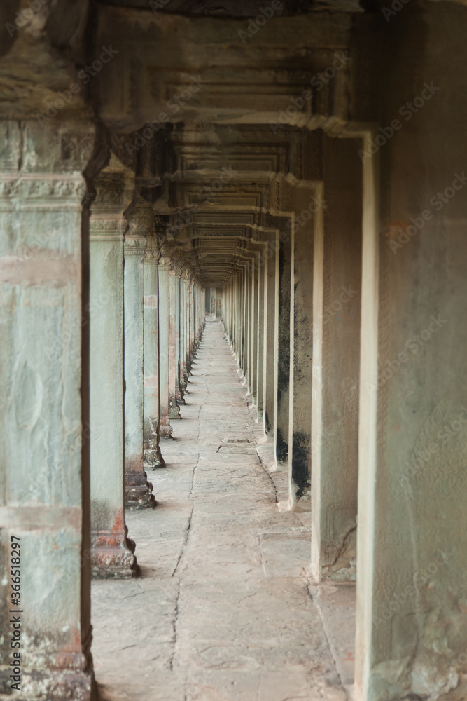 The temple complex of Angkor Watt, Cambodia, passageway with repeating arches