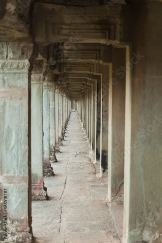 The temple complex of Angkor Watt, Cambodia, passageway with repeating arches © Keith Barnes Photos