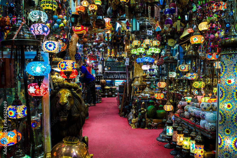 A bazaar or souq, is a permanently enclosed marketplace or street where goods and services are exchanged or sold. Arabian Peninsula Traditional Omani souk, bazaar in Muscat, capital of O