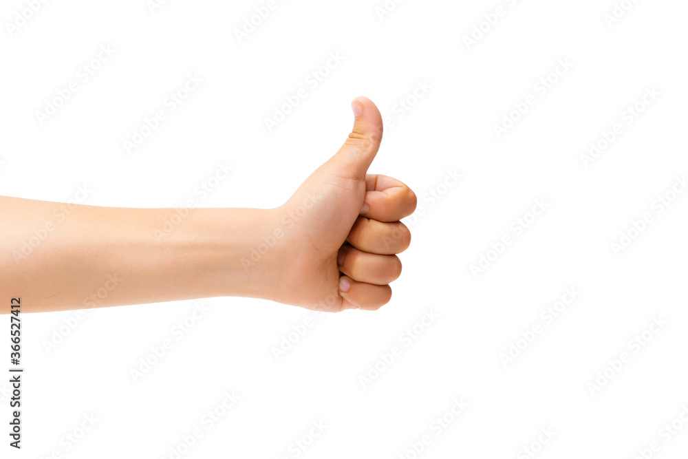 Thumb up. Children's hand, palm gesturing isolated on white studio background with copyspace for your advertising. Little girl's hand with signs. Childhood, education, sales, ad, expression concept. Thumb up. Children's hand, palm gesturing isolated on white studio background with copyspace for your advertising. Little girl's hand with signs. Childhood, education, sales, ad, expression concept.